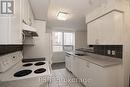 404 - 4 Elsinore Path, Toronto, ON  - Indoor Photo Showing Kitchen 