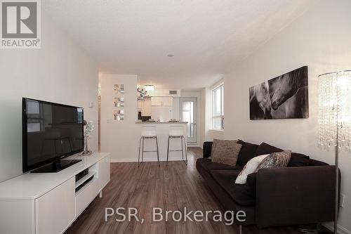 404 - 4 Elsinore Path, Toronto, ON - Indoor Photo Showing Living Room