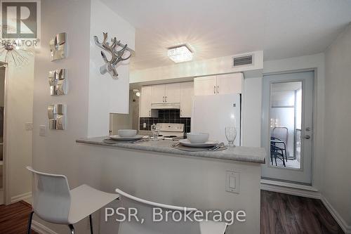 404 - 4 Elsinore Path, Toronto, ON - Indoor Photo Showing Kitchen