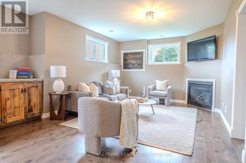 484 Ennis Road, Smith-Ennismore-Lakefield, ON - Indoor Photo Showing Other Room With Fireplace