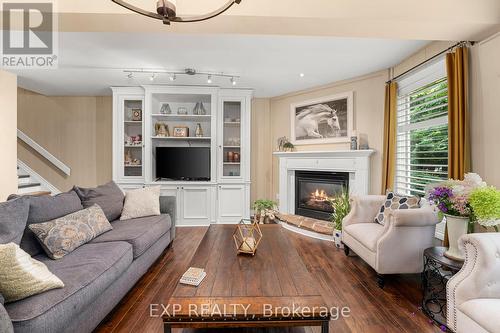 82 Ninth Street, Brock, ON - Indoor Photo Showing Living Room With Fireplace