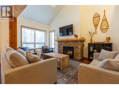 5423 Boomerang Way Unit# 36, Fernie, BC - Indoor Photo Showing Living Room With Fireplace