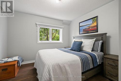 303 - 112 Simcoe Road, Bradford West Gwillimbury (Bradford), ON - Indoor Photo Showing Bedroom