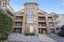 211 - 1450 Bishops Gate, Oakville, ON  - Outdoor With Balcony With Facade 