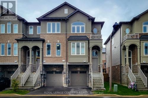 24 Aqua Lane N, Hamilton, ON - Outdoor With Facade