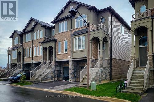 24 Aqua Lane N, Hamilton, ON - Outdoor With Facade