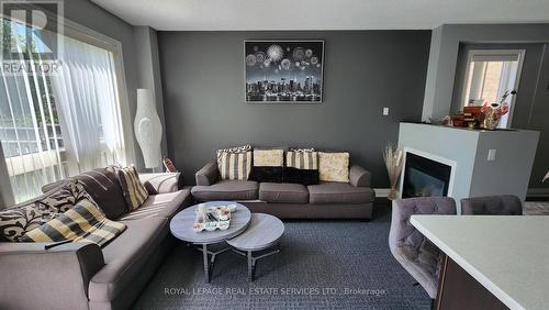 5672 Raleigh Street, Mississauga, ON - Indoor Photo Showing Living Room With Fireplace