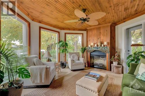 5791 Kelly Marie Drive, Ottawa, ON - Indoor Photo Showing Living Room With Fireplace