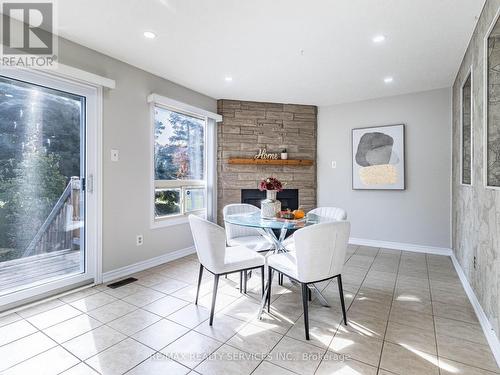 42 - 36 Farnham Drive, Brampton, ON - Indoor Photo Showing Dining Room With Fireplace