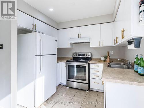 42 - 36 Farnham Drive, Brampton, ON - Indoor Photo Showing Kitchen With Double Sink