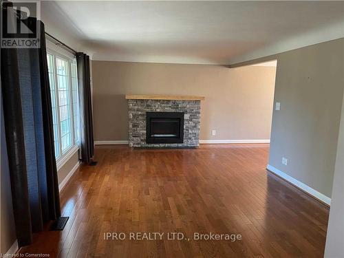 585 Garner Road W, Hamilton, ON - Indoor Photo Showing Living Room With Fireplace