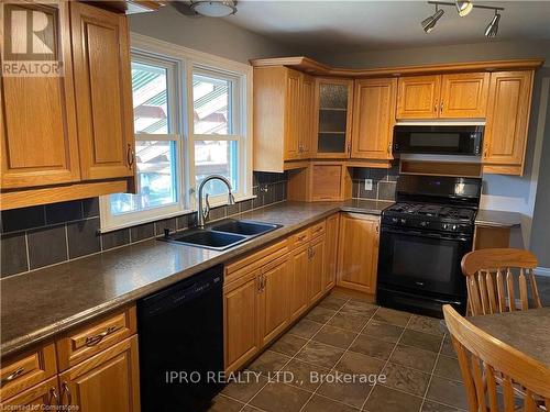 585 Garner Road W, Hamilton, ON - Indoor Photo Showing Kitchen With Double Sink