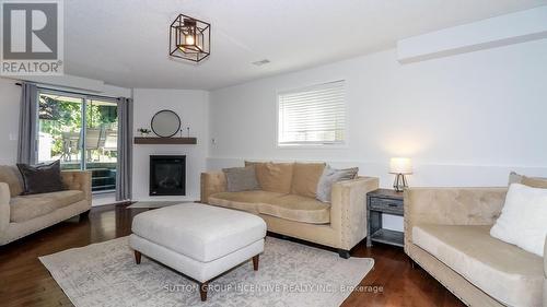 99 Churchland Drive, Barrie, ON - Indoor Photo Showing Living Room With Fireplace