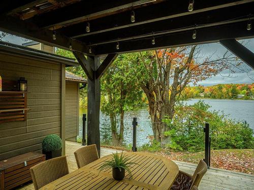 Patio - 24 Ch. Du Lac-Maillé, Saint-Hippolyte, QC - Outdoor With Body Of Water With Deck Patio Veranda With Exterior