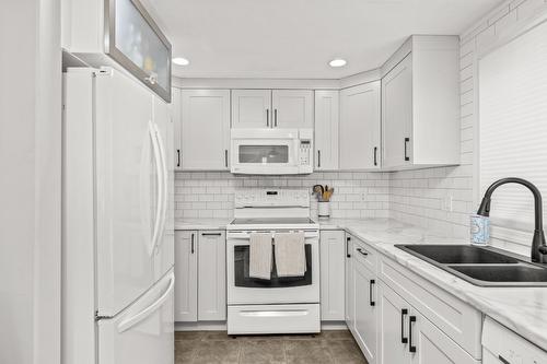 B-3758 Wetton Road, West Kelowna, BC - Indoor Photo Showing Kitchen With Double Sink With Upgraded Kitchen