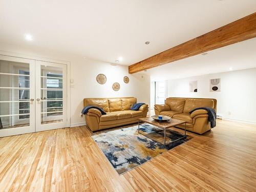 Salle familiale - 156 Rue Jean-De Fonblanche, Carignan, QC - Indoor Photo Showing Living Room