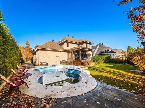 Cour - 156 Rue Jean-De Fonblanche, Carignan, QC - Outdoor With In Ground Pool With Backyard