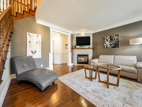 Salon - 156 Rue Jean-De Fonblanche, Carignan, QC - Indoor Photo Showing Living Room With Fireplace