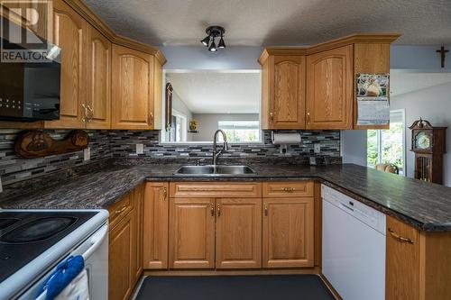 7713 Thompson Drive, Prince George, BC - Indoor Photo Showing Kitchen With Double Sink