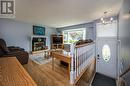 7713 Thompson Drive, Prince George, BC  - Indoor Photo Showing Living Room With Fireplace 