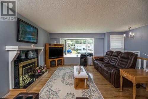 7713 Thompson Drive, Prince George, BC - Indoor Photo Showing Living Room With Fireplace