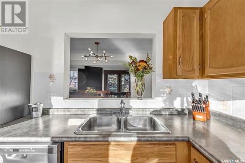 7 455 Pinehouse Drive, Saskatoon, SK - Indoor Photo Showing Kitchen With Double Sink