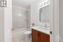 Main bath featuring quartz countertop - 