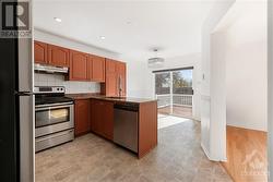 Kitchen featuring granite countertops and plenty of cupboard space - 