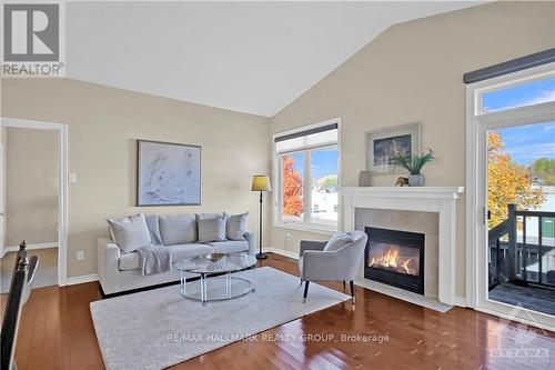 37 Village Walk, Ottawa, ON - Indoor Photo Showing Living Room With Fireplace