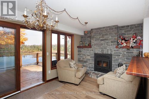 14 Bayview Drive, Kawartha Lakes (Coboconk), ON - Indoor Photo Showing Living Room With Fireplace