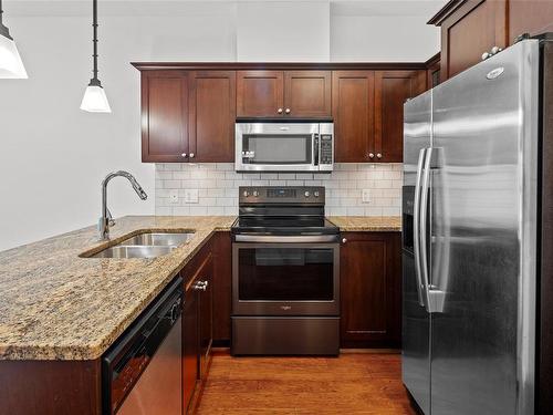 301-201 Nursery Hill Dr, View Royal, BC - Indoor Photo Showing Kitchen With Stainless Steel Kitchen With Double Sink