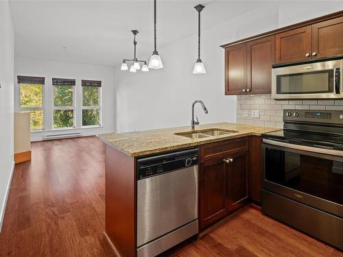 301-201 Nursery Hill Dr, View Royal, BC - Indoor Photo Showing Kitchen With Stainless Steel Kitchen With Double Sink