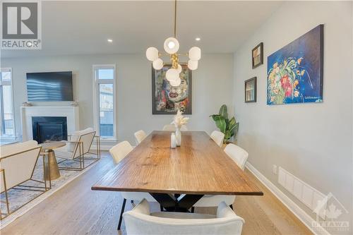 315 Wigwas Street, Ottawa, ON - Indoor Photo Showing Dining Room With Fireplace