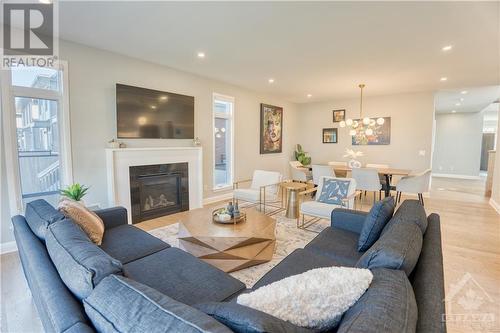 315 Wigwas Street, Ottawa, ON - Indoor Photo Showing Living Room With Fireplace