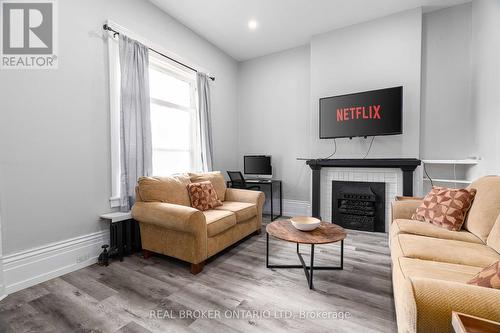 300 Oxford Street E, London, ON - Indoor Photo Showing Living Room With Fireplace