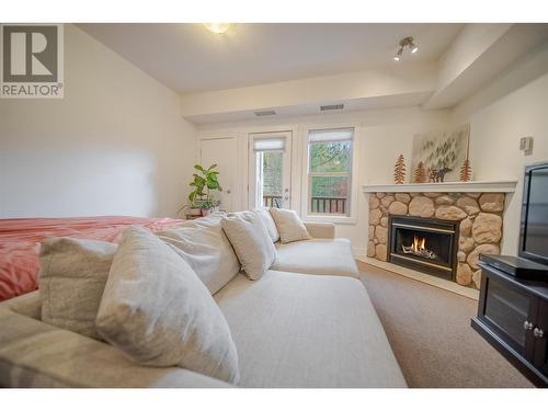 1500 Mcdonald Avenue Unit# 320, Fernie, BC - Indoor Photo Showing Living Room With Fireplace