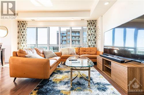 905 - 330 Titan, Ottawa, ON - Indoor Photo Showing Living Room With Fireplace