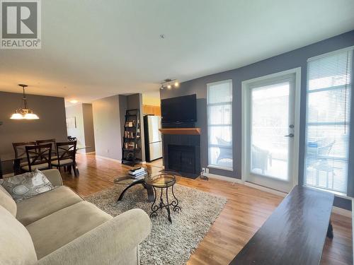 202 2575 W 4Th Avenue, Vancouver, BC - Indoor Photo Showing Living Room With Fireplace