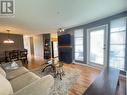 202 2575 W 4Th Avenue, Vancouver, BC  - Indoor Photo Showing Living Room With Fireplace 