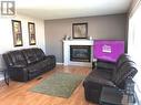 6 Echo Drive, Fort Qu'Appelle, SK  - Indoor Photo Showing Living Room With Fireplace 