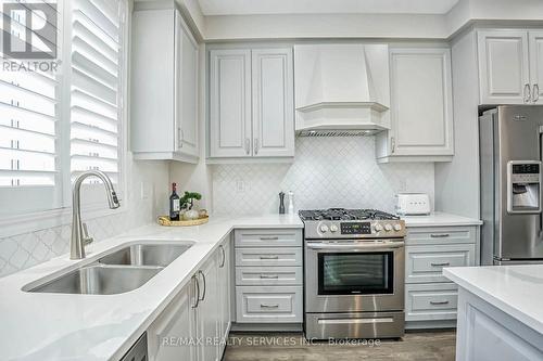 813 Proud Drive, Milton, ON - Indoor Photo Showing Kitchen With Double Sink With Upgraded Kitchen