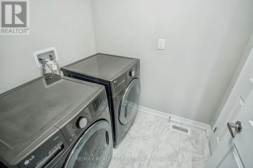 813 Proud Drive, Milton, ON - Indoor Photo Showing Laundry Room