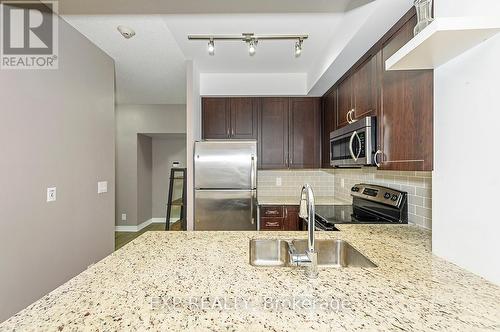 307 - 1940 Ironstone Drive, Burlington, ON - Indoor Photo Showing Kitchen With Stainless Steel Kitchen