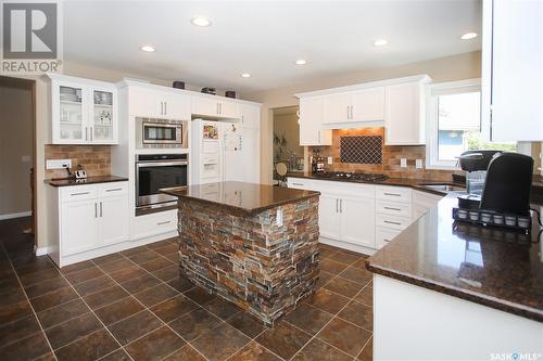 206 Braeshire Lane, Saskatoon, SK - Indoor Photo Showing Kitchen With Double Sink