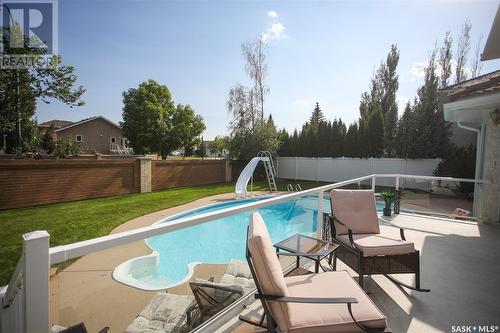 206 Braeshire Lane, Saskatoon, SK - Outdoor With In Ground Pool With Backyard