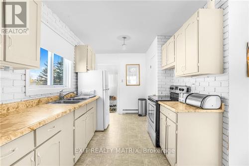 945 Queen Street, Champlain, ON - Indoor Photo Showing Kitchen With Double Sink