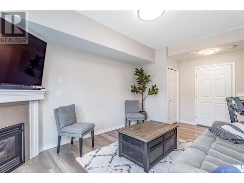 3346 Skaha Lake Road Unit# 104, Penticton, BC - Indoor Photo Showing Living Room With Fireplace