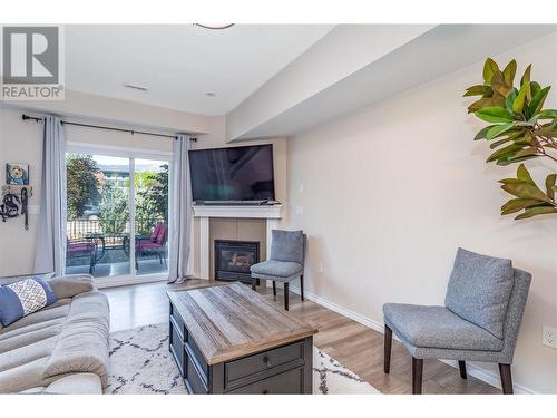 3346 Skaha Lake Road Unit# 104, Penticton, BC - Indoor Photo Showing Living Room With Fireplace