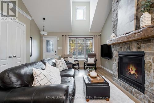 19 Lynden Street, Collingwood, ON - Indoor Photo Showing Living Room With Fireplace