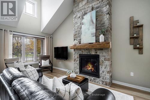 19 Lynden Street, Collingwood, ON - Indoor Photo Showing Living Room With Fireplace